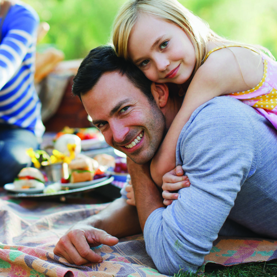 Family picnicking together outdoors